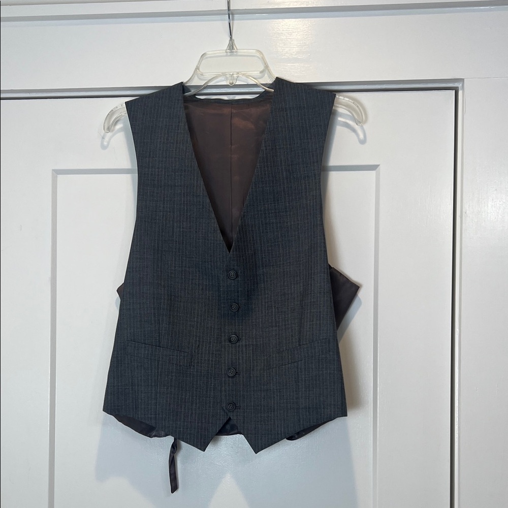 Men's Gray Vest with button front detail. No size tag.